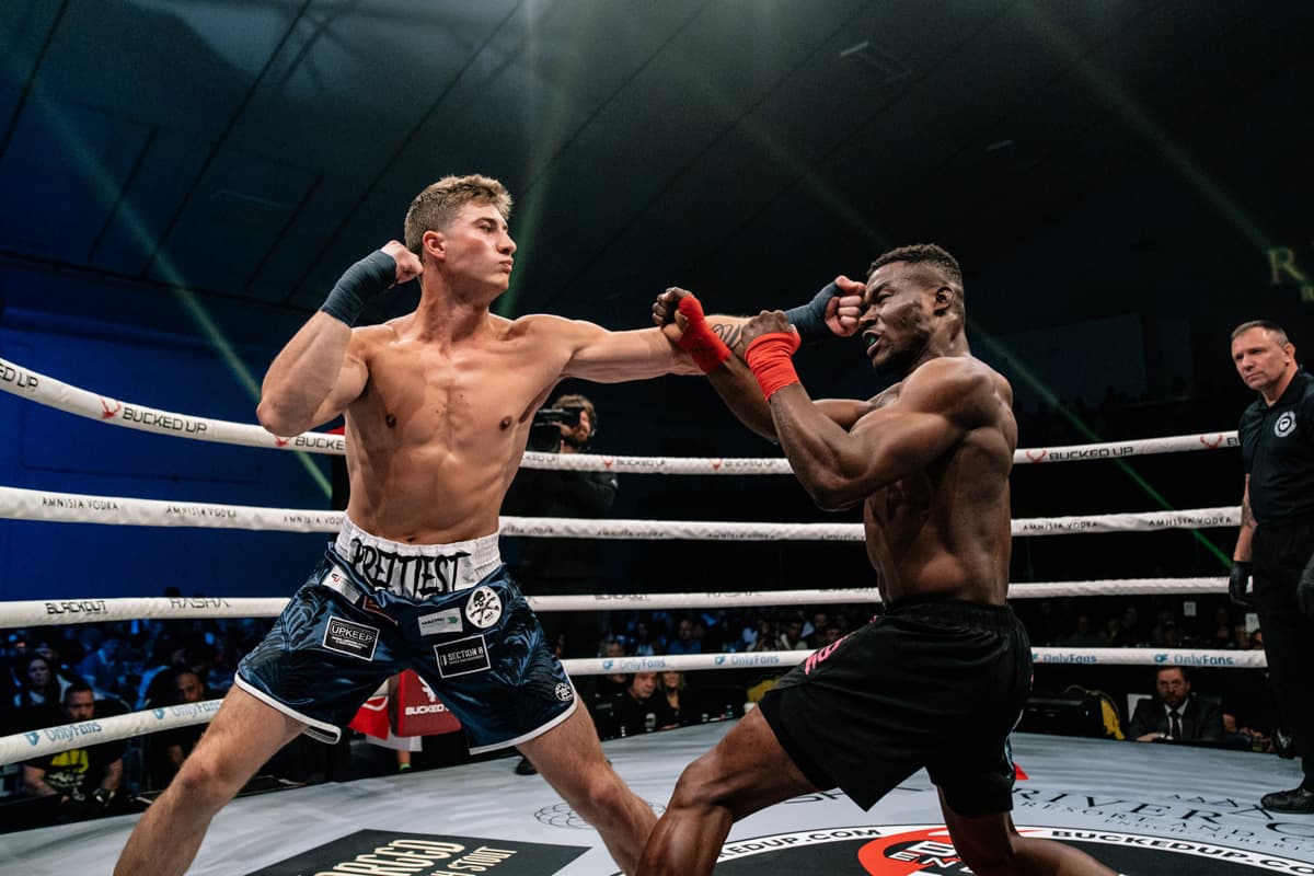 Caeden Scott punches Justin Kennedy during their bout at BKFC Fight Night Edmonton