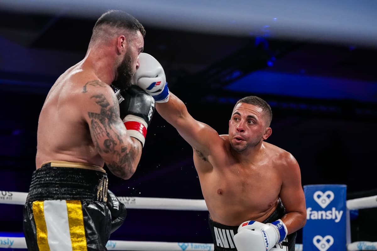 Chris Avila punches Ariel Perez during their boxing bout at Caribe Royale Orlando
