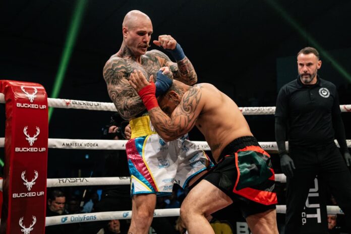 Drew Stuve punches Will Santiago during their bout at BKFC Fight Night Edmonton