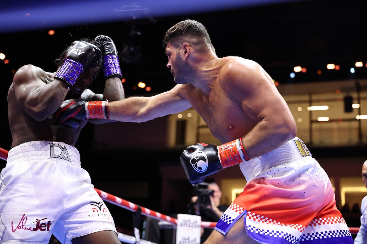 Filip Hrgovic punches David Adeleye during their boxing bout