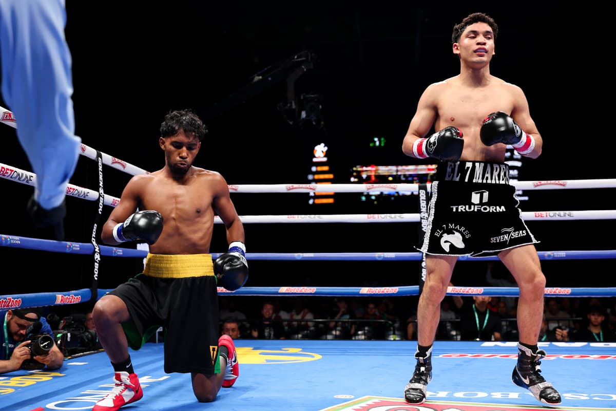 Gael Cabrera knocks down Richard Reyes Diaz during their boxing bout in Chicago