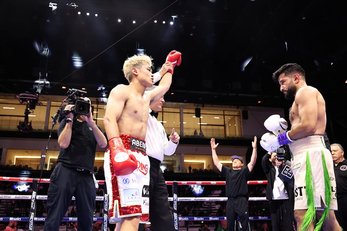 Hayato Tsutsumi defeats Qais Ashfaq during their boxing bout in Riyadh, Saudi Arabia