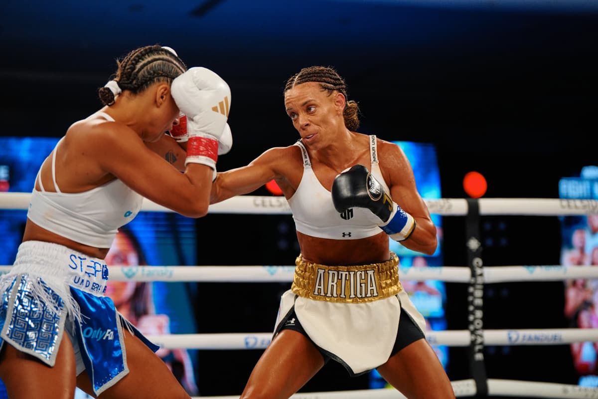 Jasmine Artiga punches Linn Sandstrom during their boxing bout at Caribe Royale Orlando