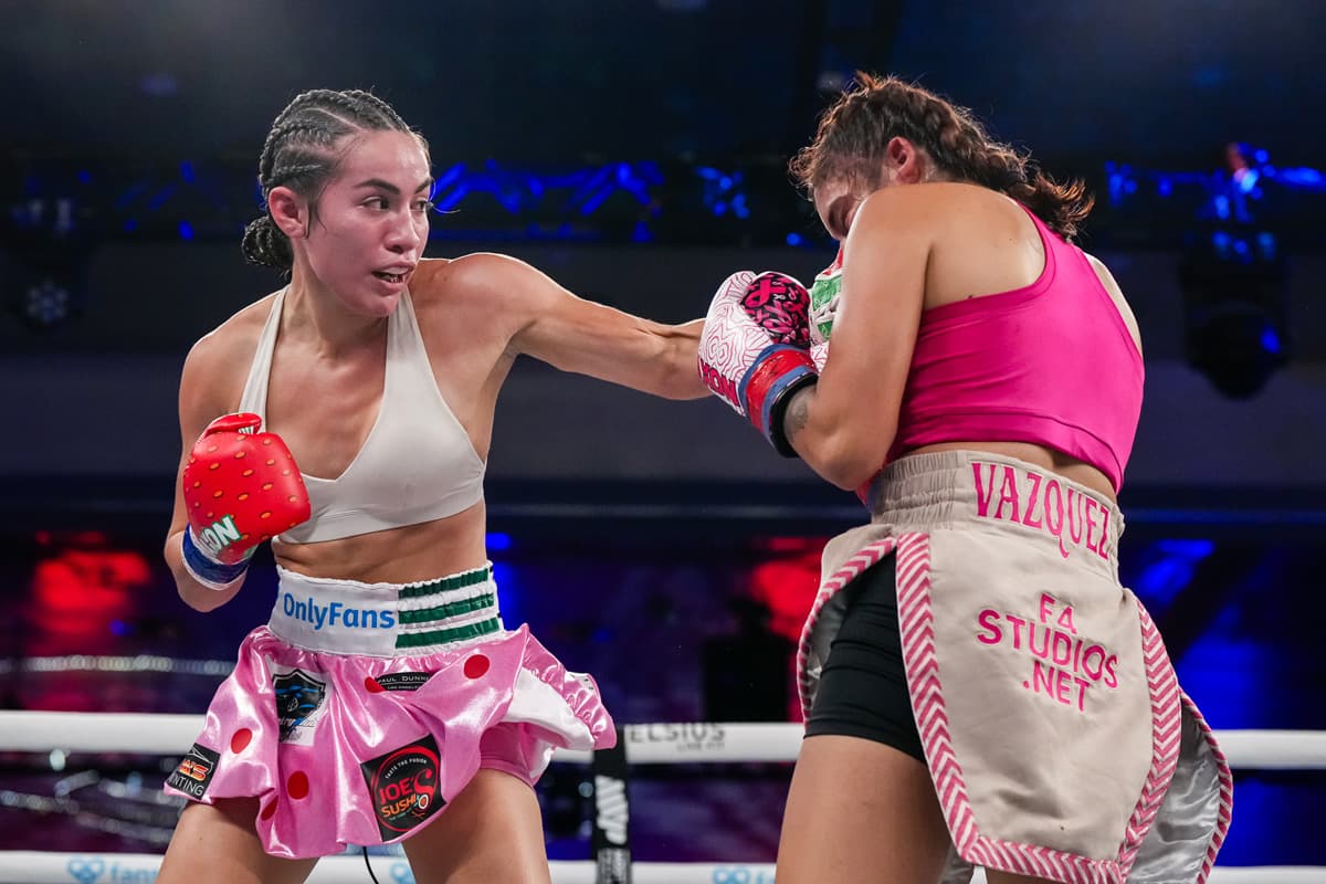 Jocelyn Camarillo punches Agustina Solange Vazquez during their boxing bout at Caribe Royale Orlando