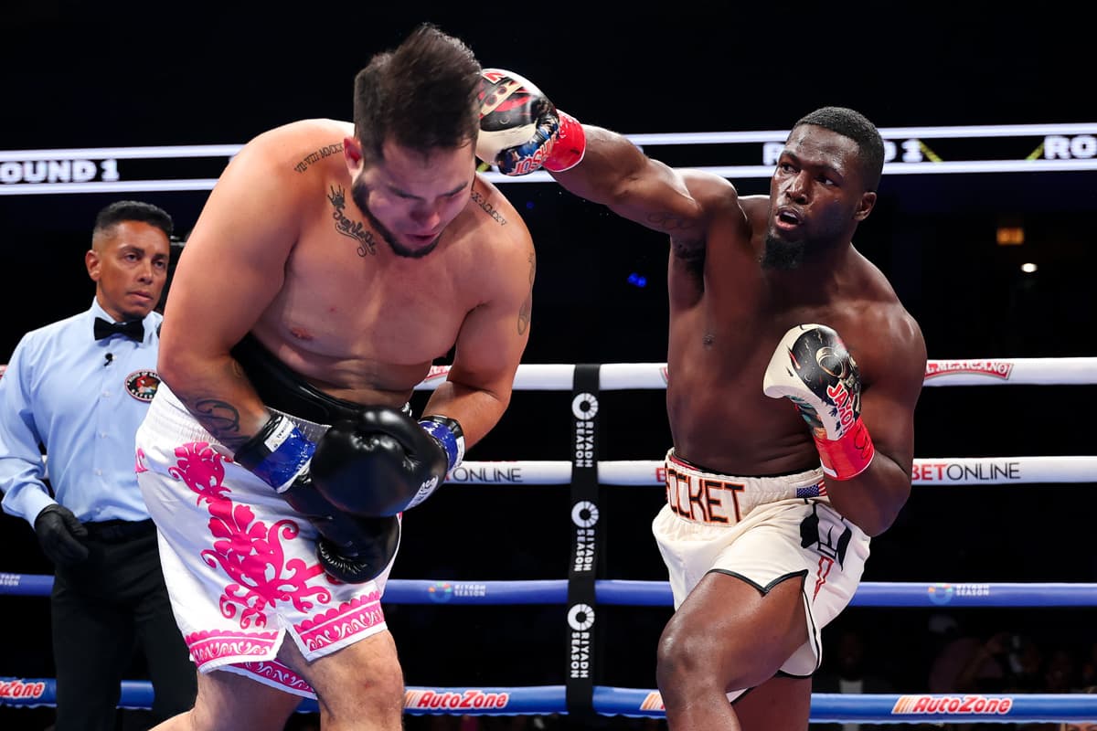 Joshua Edwards punches Cayman Audie during their boxing bout in Chicago