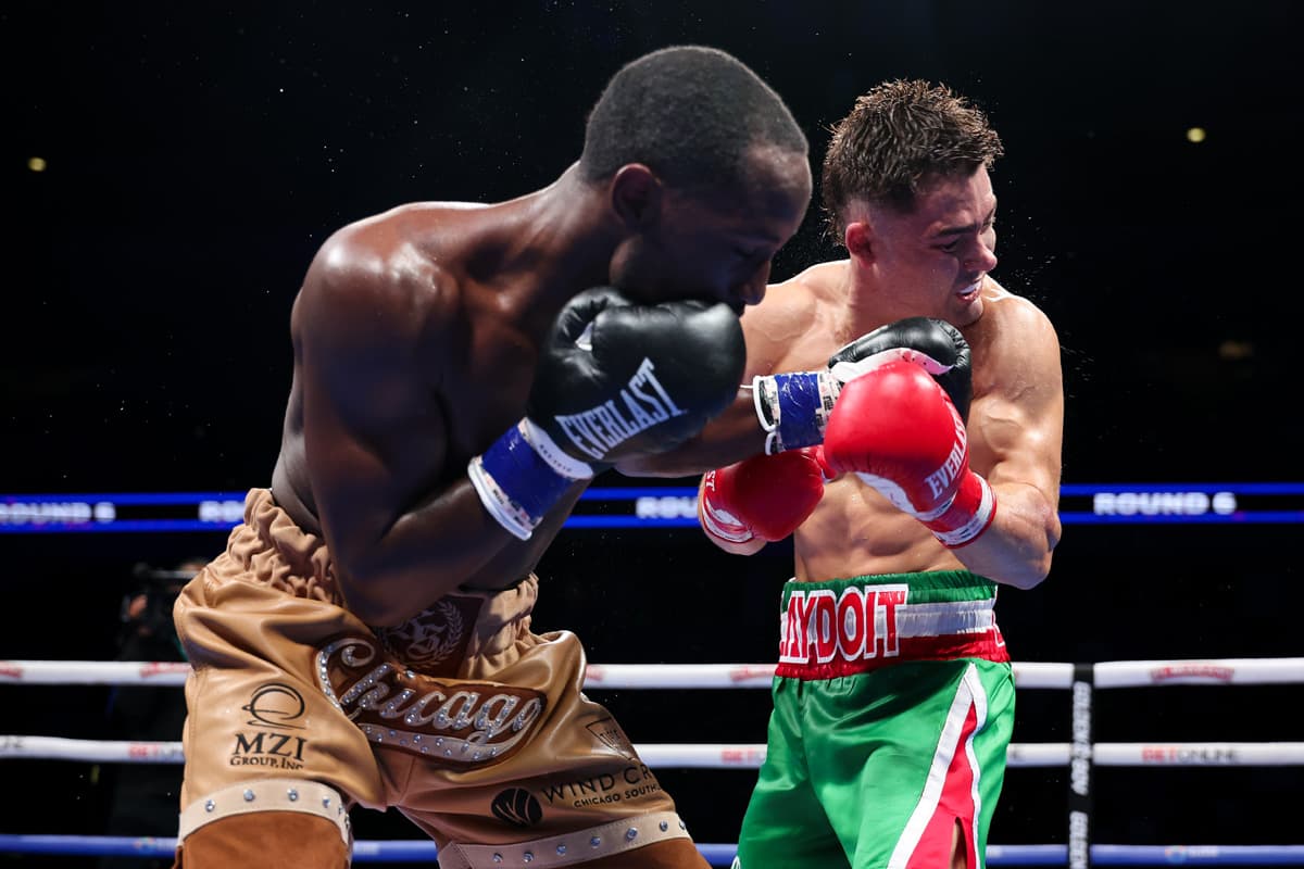 Kenneth Sims Jr. punches Oscar Duarte during their boxing bout in Chicago