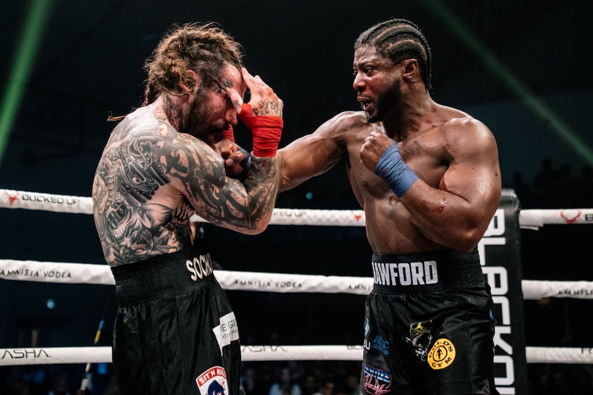 Kimani Crawford punches Matthew Socholotiuk during their bout at BKFC Fight Night Edmonton