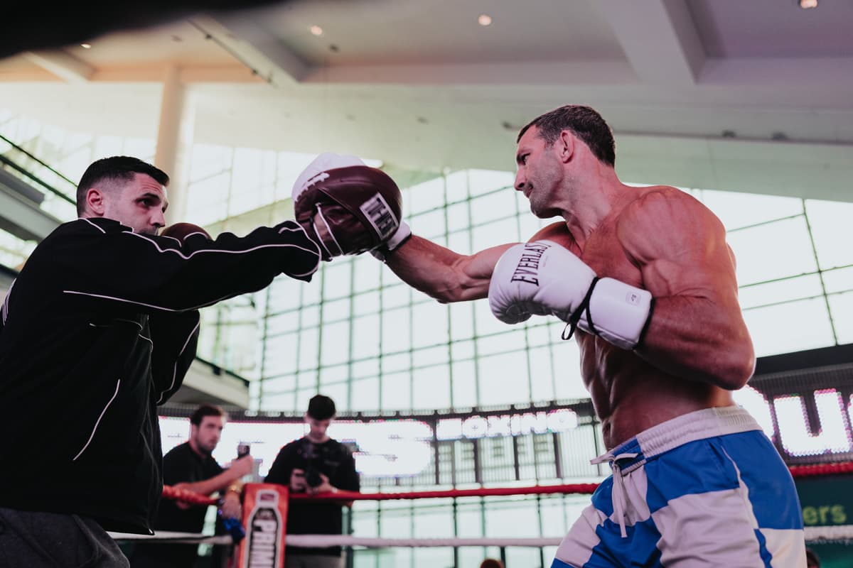 Luke Rockhold mitt work during the open workout