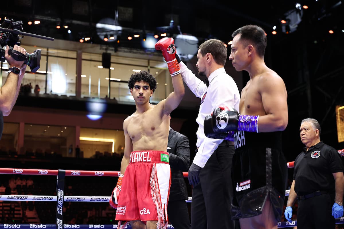 Mohammed Alakel defeats Yumnam Santosh Singh during their boxing bout in Riyadh, Saudi Arabia