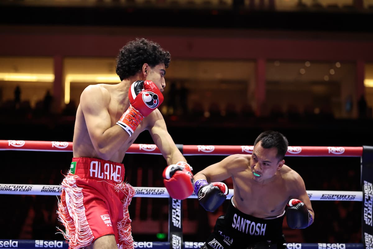 Mohammed Alakel and Yumnam Santosh Singh during their boxing bout