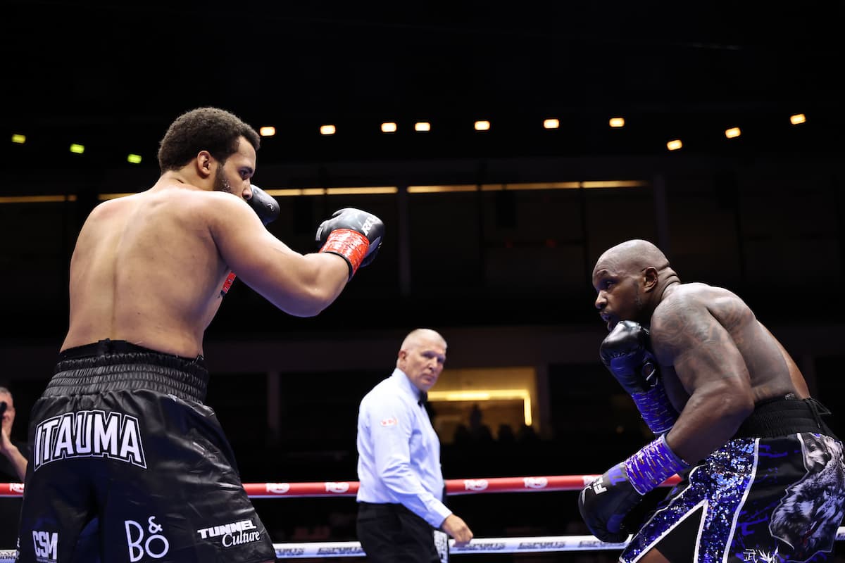 Moses Itauma and Dillian Whyte during their boxing bout