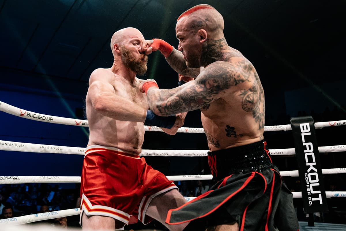 Nick Felber punches James Dalzell during their bout at BKFC Fight Night Edmonton