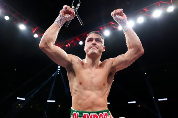 Oscar Duarte celebrates victory over Kenneth Sims Jr. during their boxing bout in Chicago