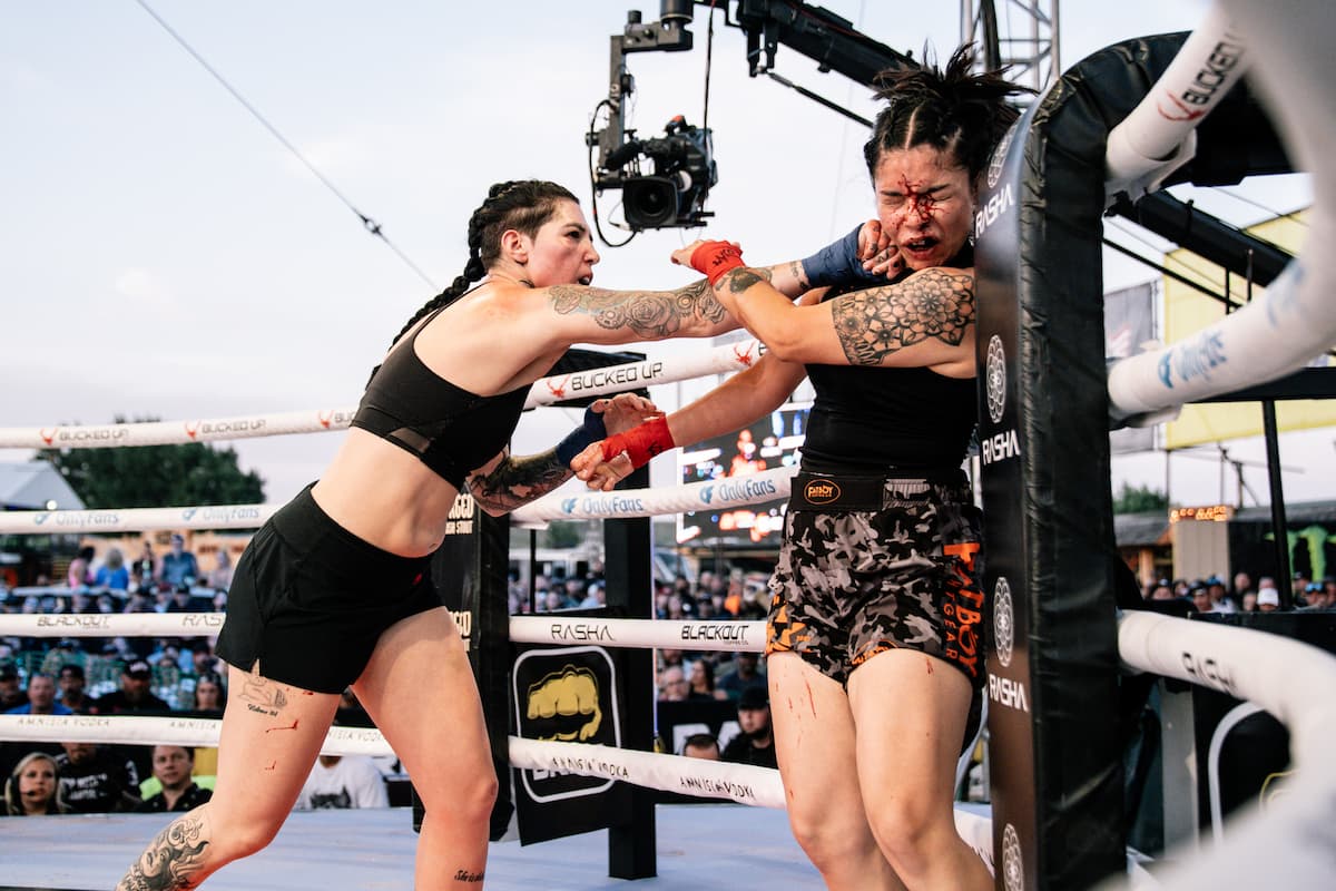 Shyanna Bintliff punches Marisol Ruelas during their bare-knuckle boxing bout at the Legendary Sturgis Buffalo Chip in Sturgis, SD