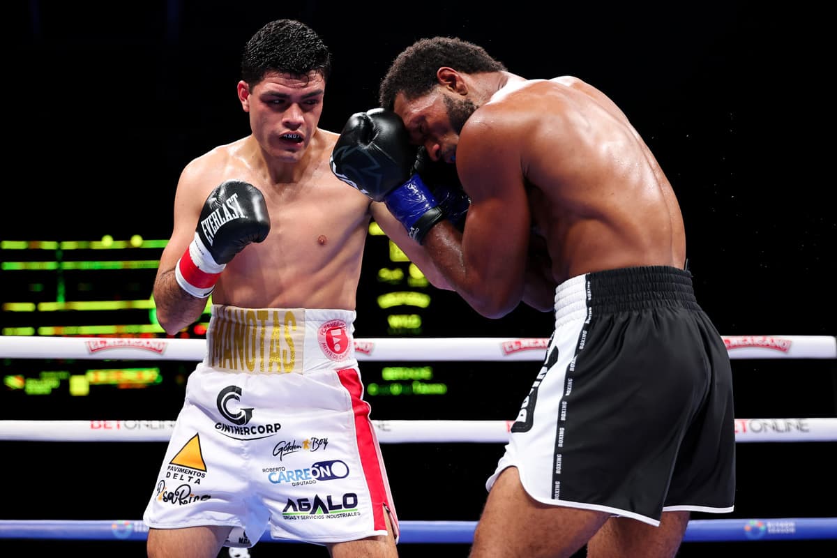 Yair Benjamin Gallardo-Lozano punches Quinton Rankin during their boxing bout in Chicago