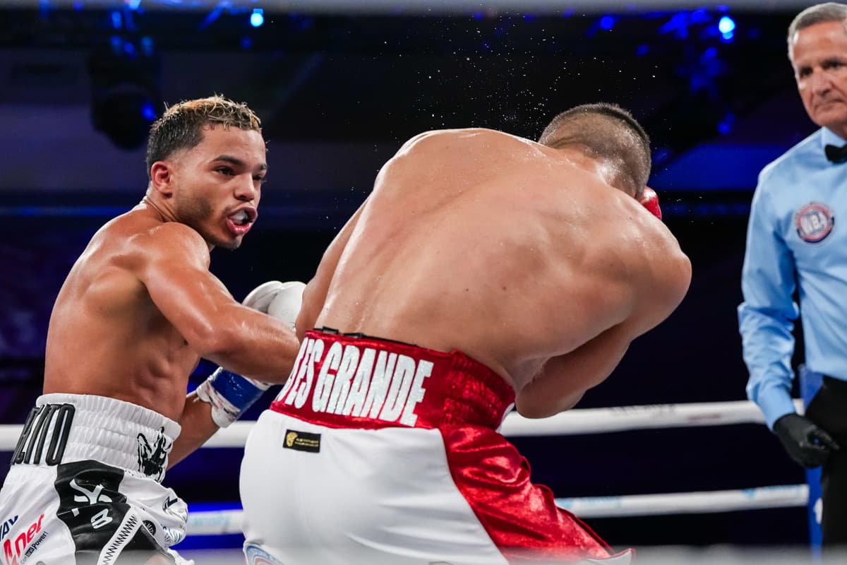 Yankiel Rivera punches Angelino Cordova during their boxing bout at Caribe Royale Orlando