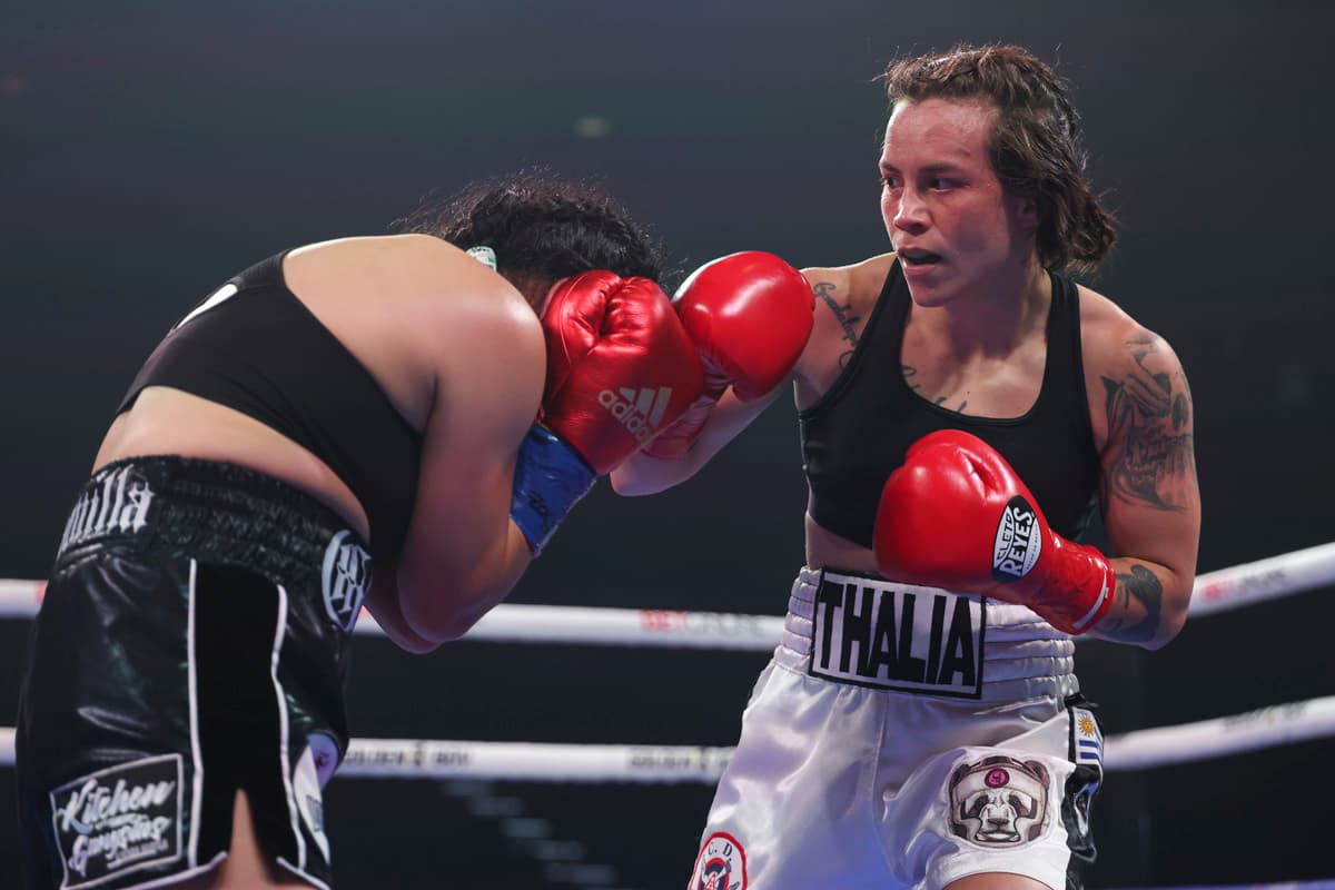 Adriana Pineiro throws a punch during her bout against Gloria Munguilla