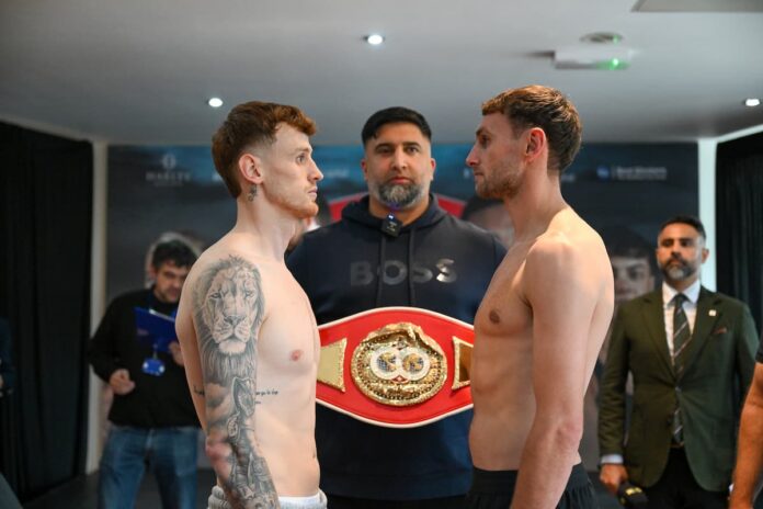 Ben Crocker and Sean McComb face off at the weigh-in, ahead of their boxing bout in Sheffield