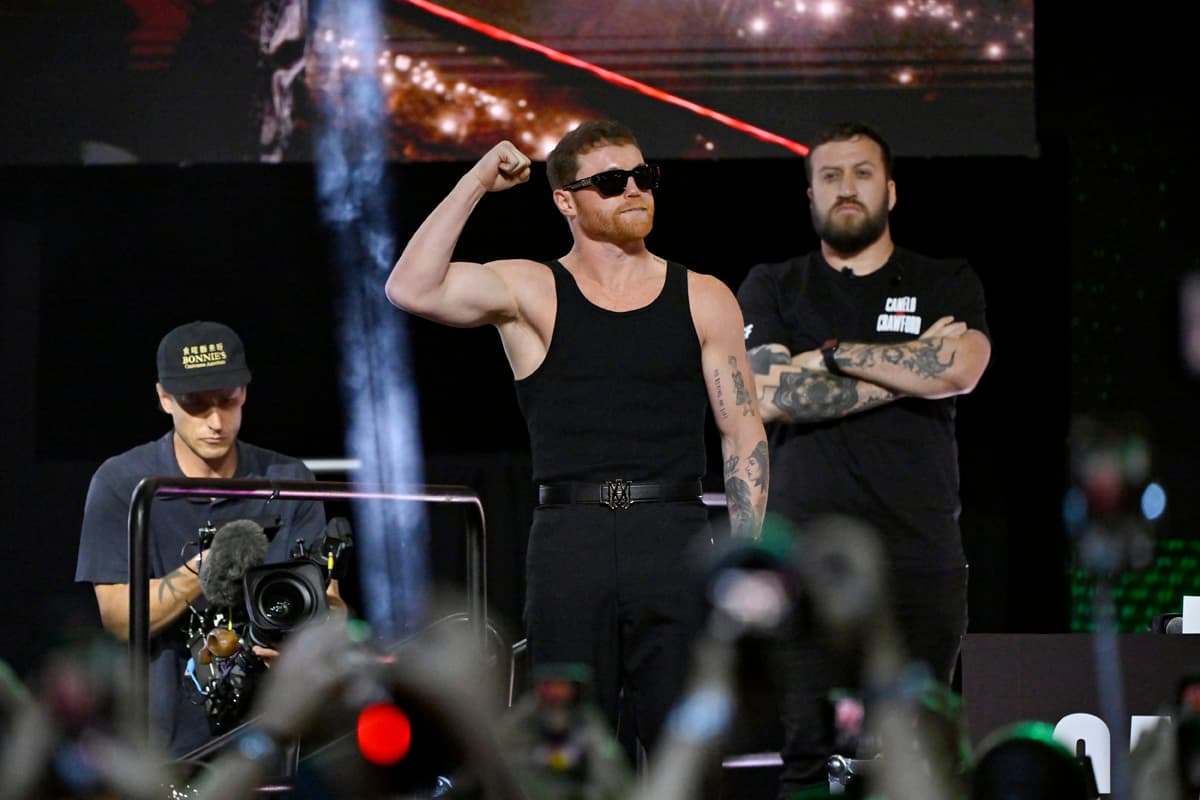Canelo Alvarez makes his entrance at the press conference