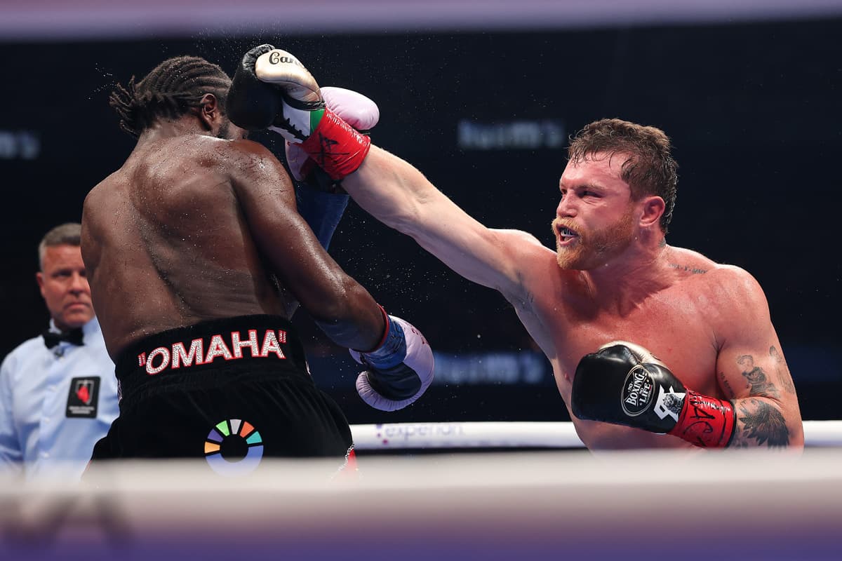 Canelo Alvarez throws a punch during his boxing bout against Terence Crawford