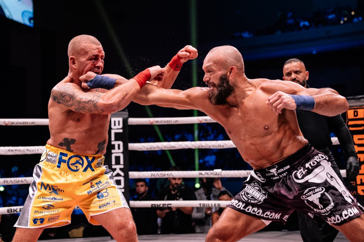 Edgard Plazaola punches Gary Fox during their bare-knuckle boxing bout