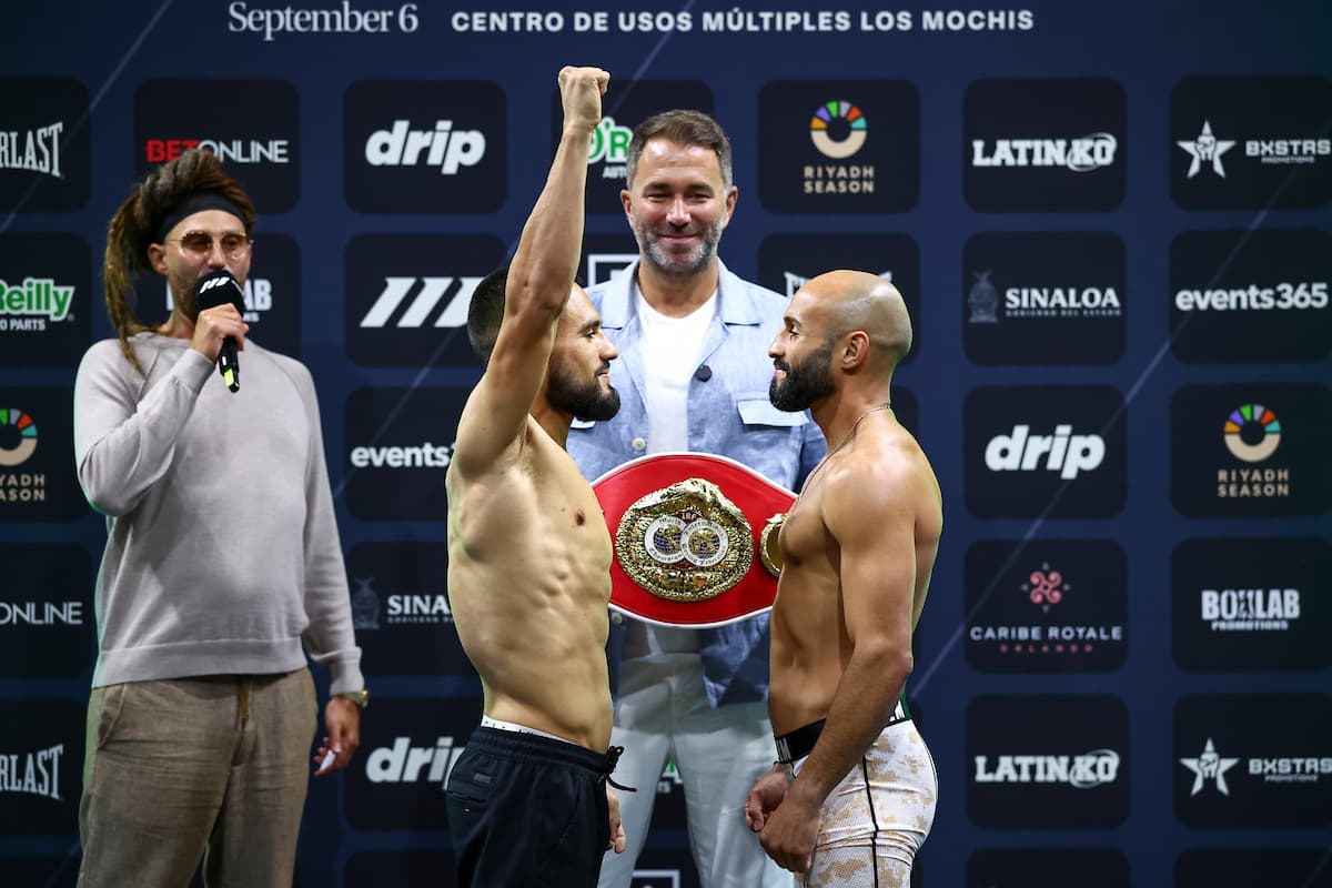 Eduardo Nunez and Christopher Diaz face off during the weigh-in ahead of their boxing bout