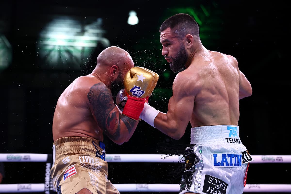 Eduardo Nunez lands an uppercut during his boxing bout against Christopher Diaz