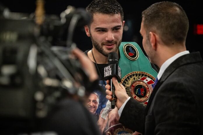 Erik Bazinyan speaks during the post-fight interview