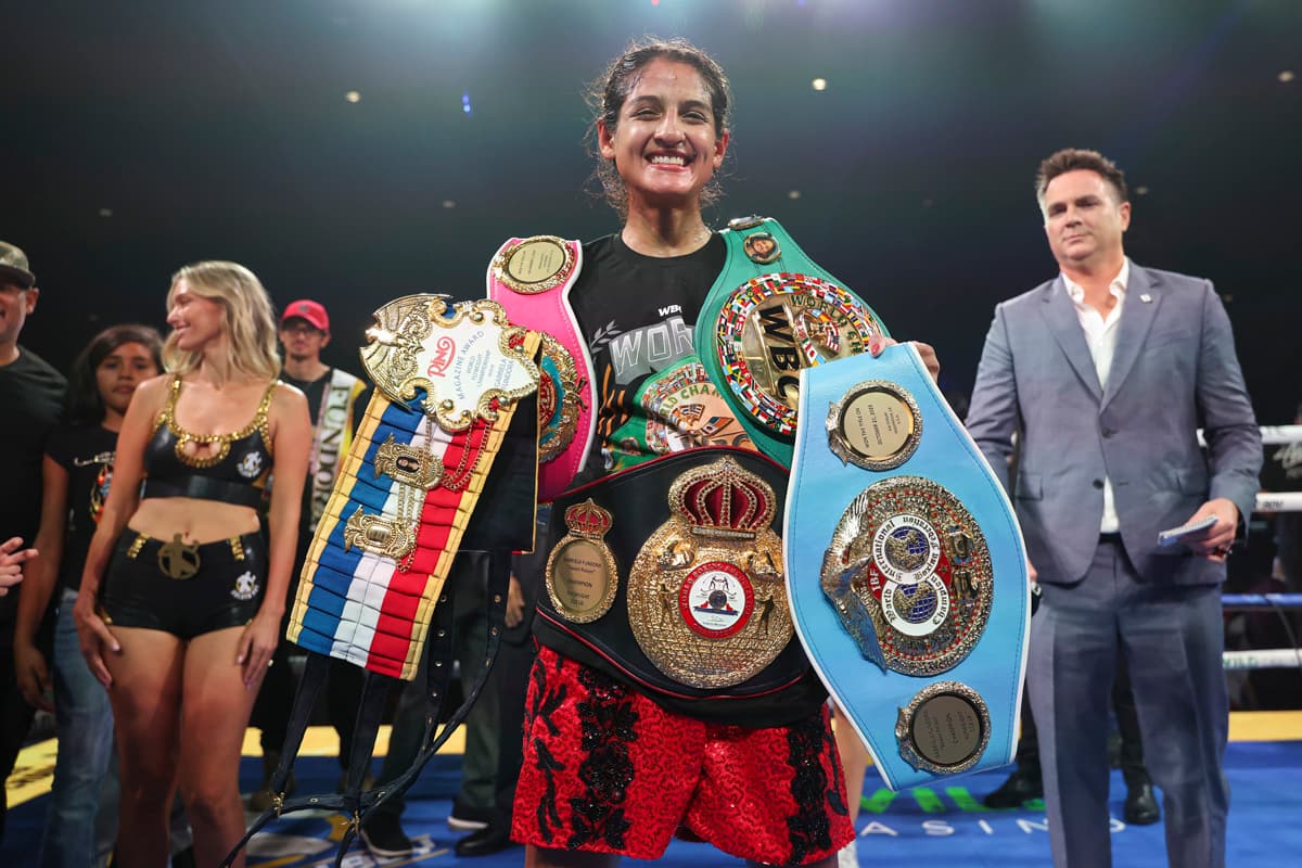 Gabriela Fundora with her championship belts