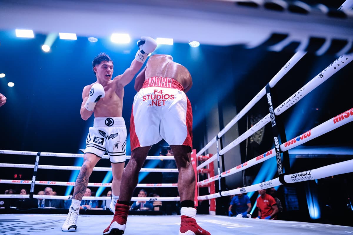 Javon Walton throws a punch during his bout against Anthony Mora