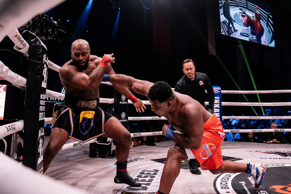 Leonardo Perdomo punches Arnold Adams during their bare-knuckle rematch