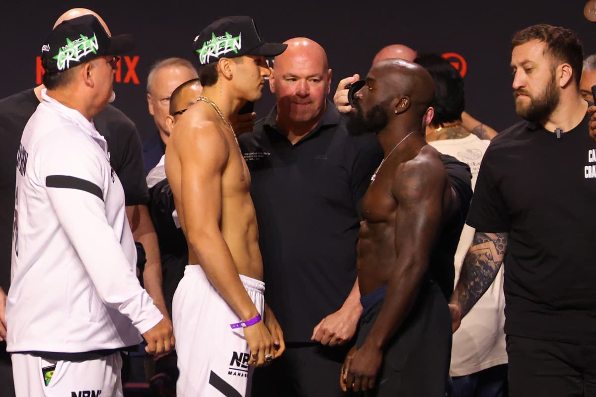 Marco Verde and Sona Akale face off during the weigh-in ahead of their boxing bout