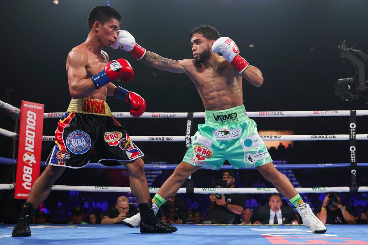 Oscar Collazo throws a jab during his bout against Jayson Vayson