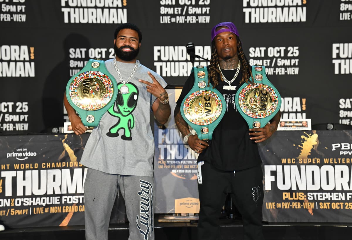 O'Shaquie Foster and Stephen Fulton pose during the press conference