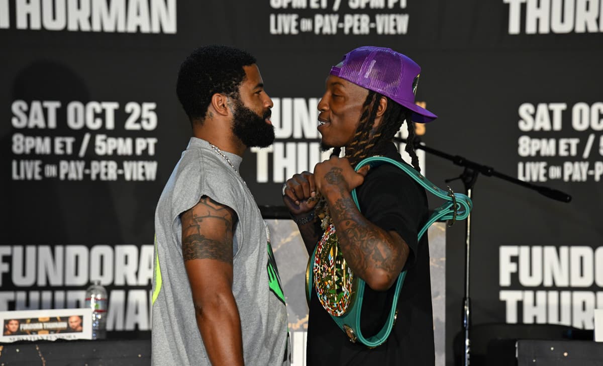 O'Shaquie Foster and Stephen Fulton face off during the press conference