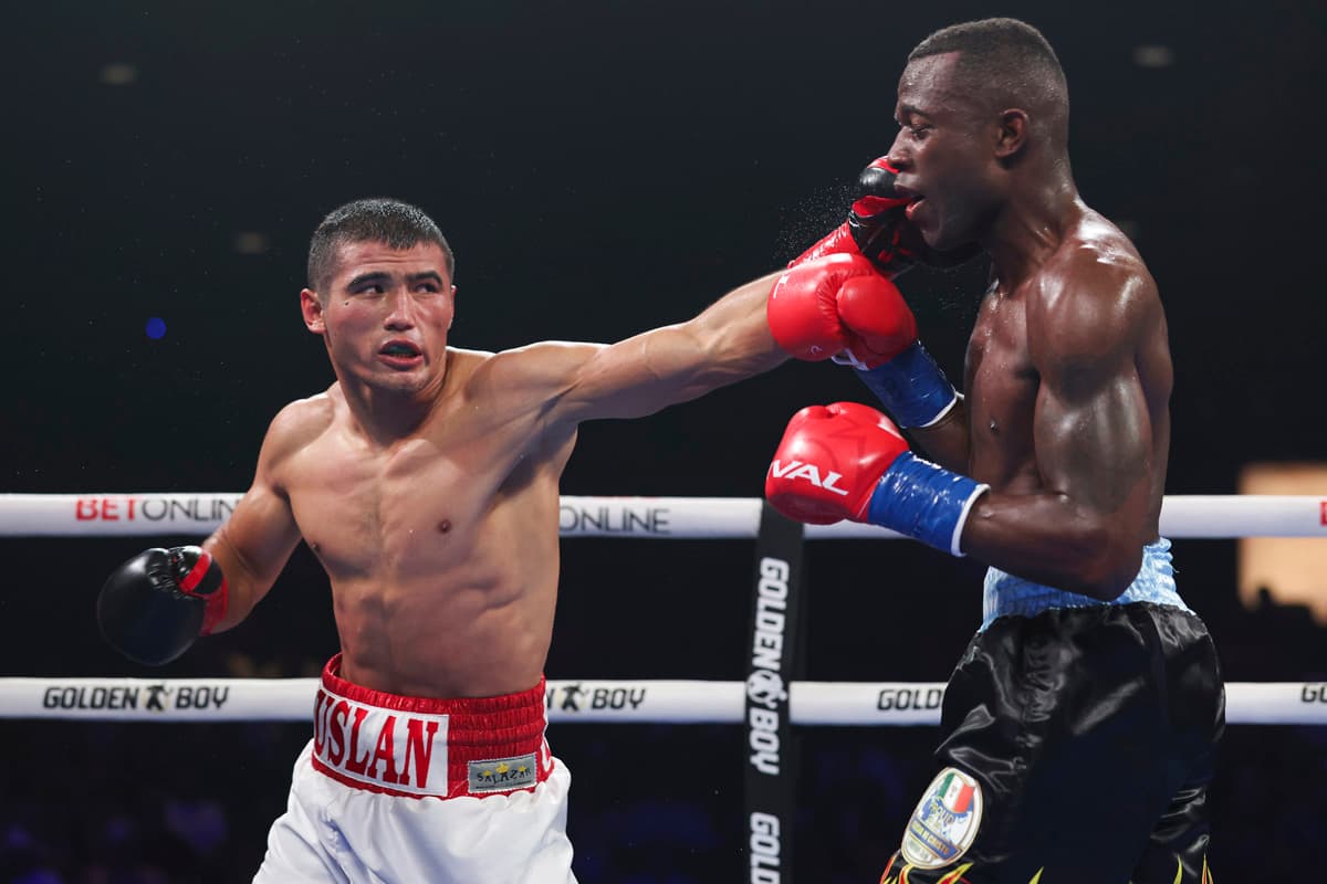 Ruslan Abdullaev throws a punch during his bout against Kevin Johnson