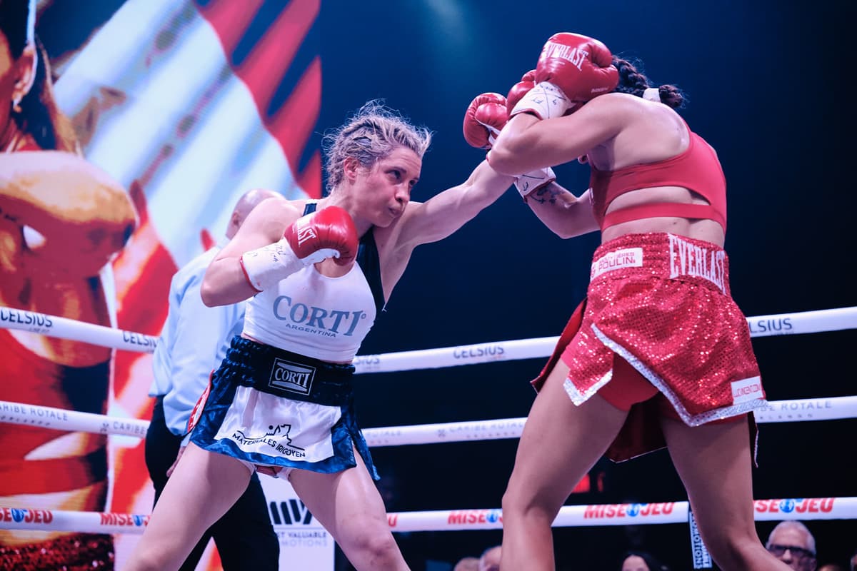 Sol Cudos throws a jab during her bout against Kim Clavel