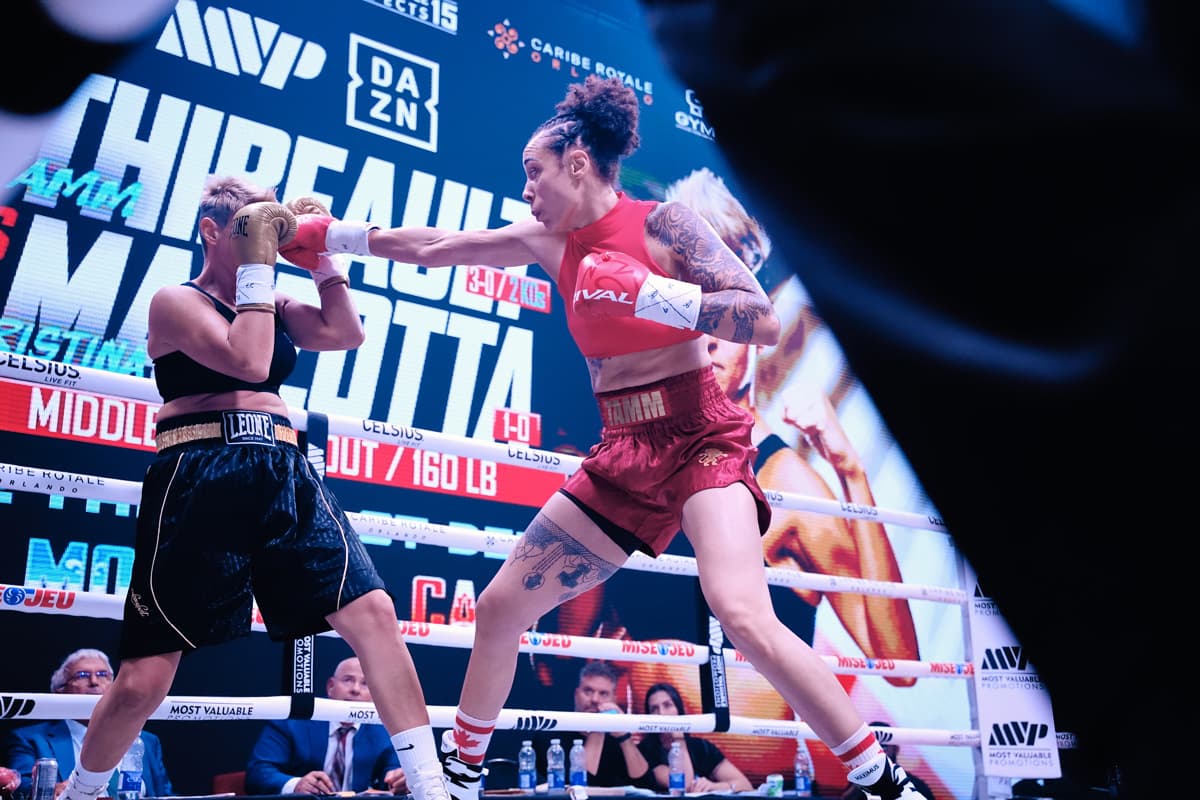 Tamm Thibeault throws a jab during her bout against Cristina Mazzotta