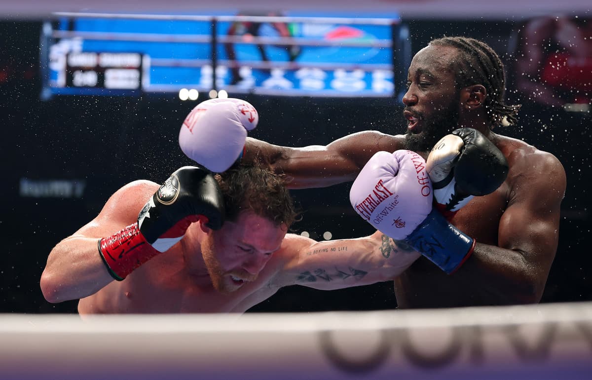 Canelo Alvarez and Terence Crawford during their boxing bout