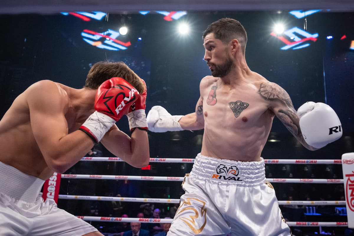 Wyatt Sanford dominates Semjon Kamanin during their boxing bout