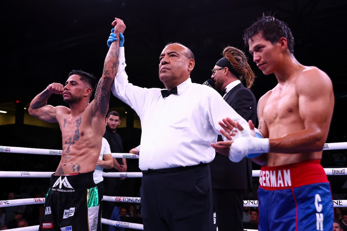 Yoali Mejia Mosqueda defeats German Valenzuela Barreras during their boxing bout