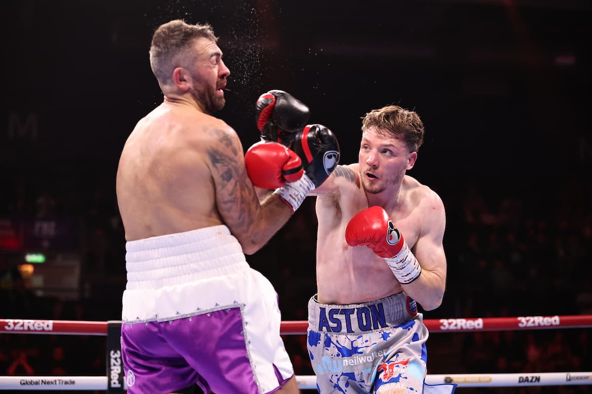 Aston Brown punches Paul Kean during their boxing bout