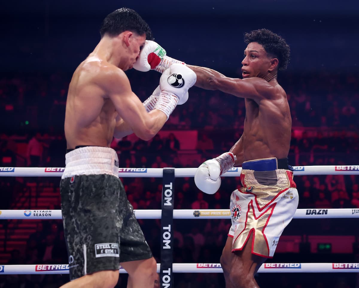 Bilal Fawaz punches Junaid Bostan during their boxing bout