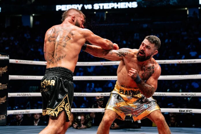 Mike Perry punches Jeremy Stephens during their bout