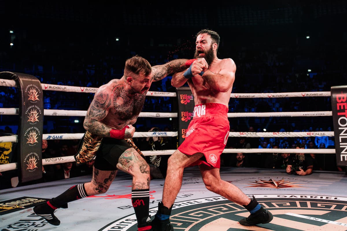 Josef Hala punches Francesco Ricchi during their bout