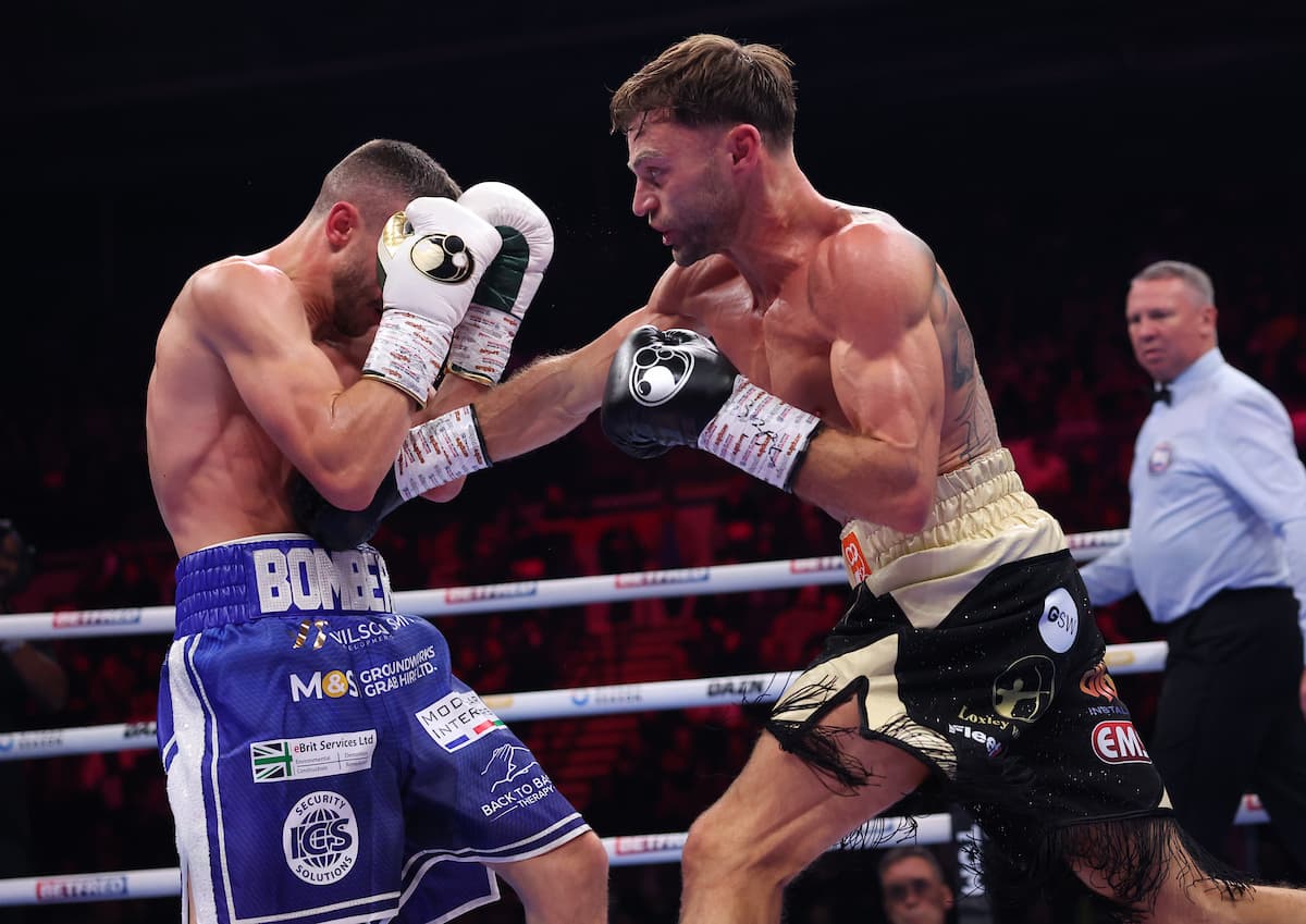 Josh Padley punches Reece Bellotti during their boxing bout