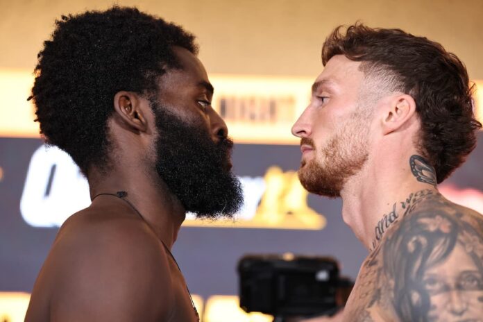 Joshua Buatsi and Zach Parker face off at the weigh-in, ahead of their boxing bout in Manchester