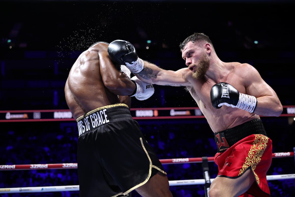Juergen Uldedaj punches Rolly Lambert Fogoum