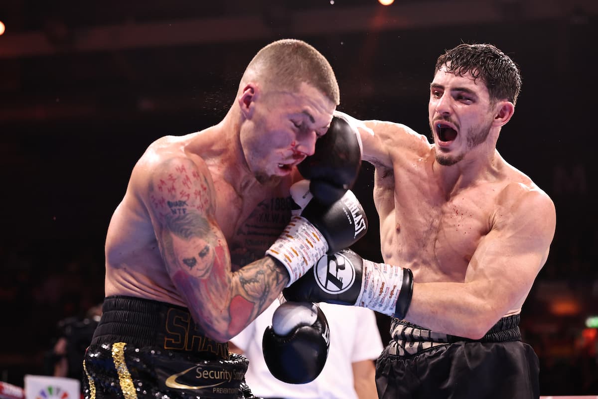 Louie O'Doherty punches Regan Glackin during their boxing bout
