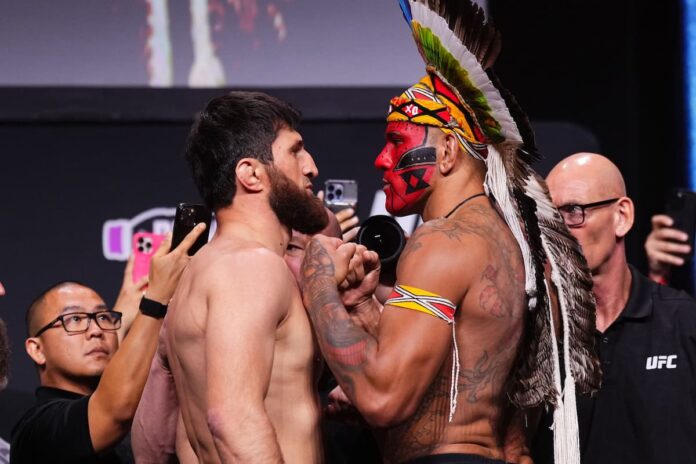 Magomed Ankalaev and Alex Pereira face off at the UFC 320 ceremonial weigh-in in Las Vegas